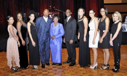 Rushion and Cicely McDonald present the first of $75,000 in scholarships to African American Students